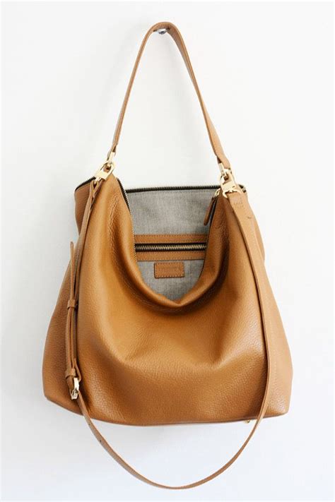 tan leather hobo hermes|hermes leather handbags.